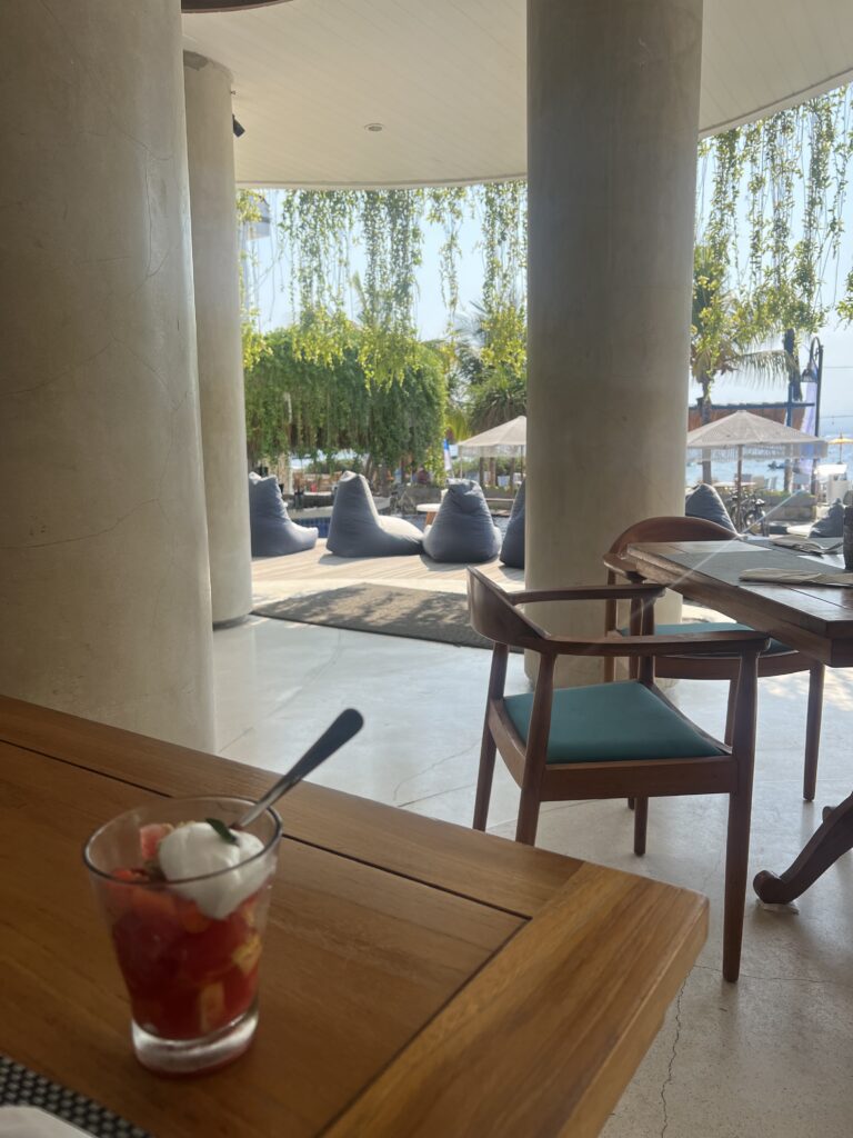 a cup of fruit and yogurt at t at Beach House Resort