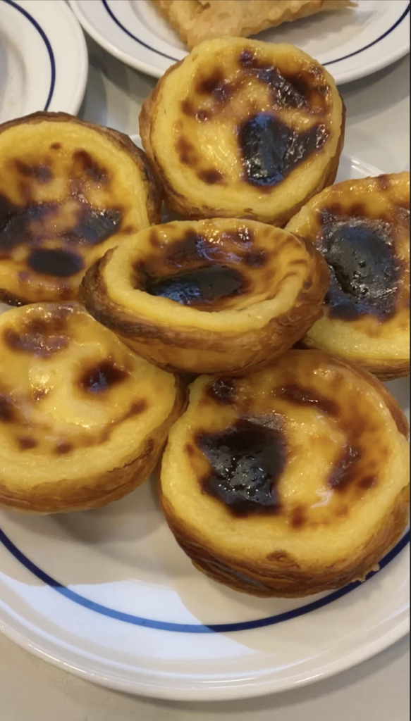 a plate of 7 pastel de belem Portuguese pastries 