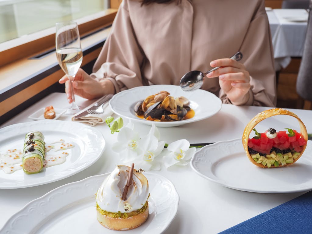 Woman Eating a Meal in a Restaurant