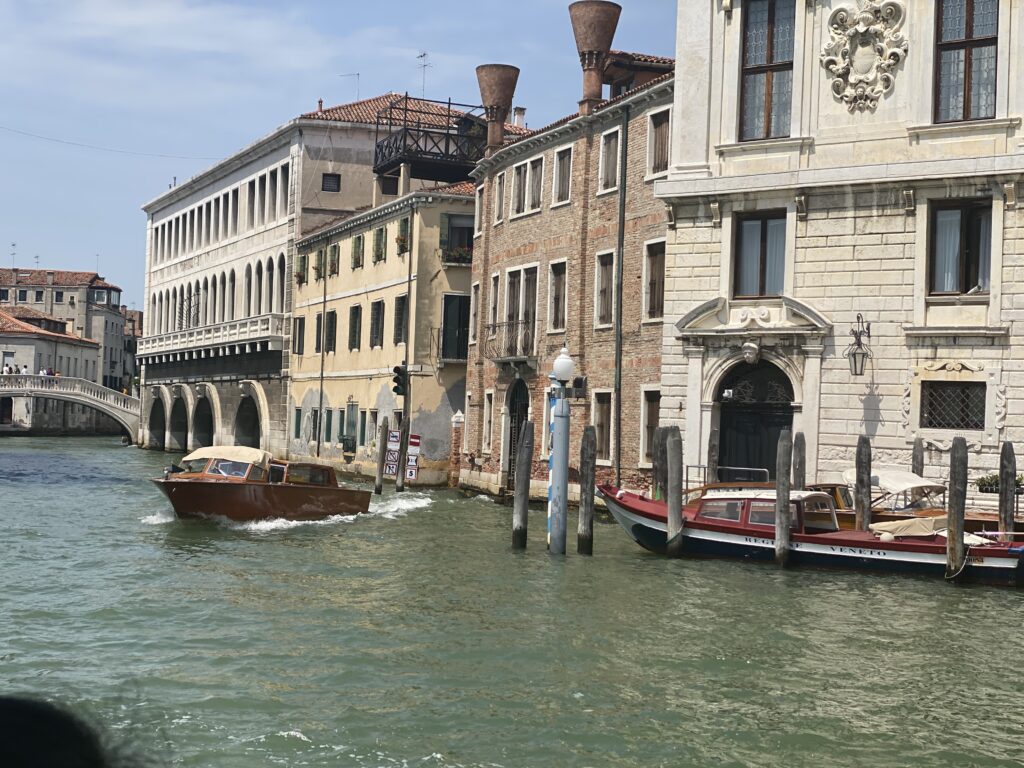 Venice waterfront with boats and buildings