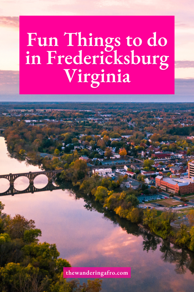 Pinterest pin that says "Fun things to do in Fredericksburg". Image of a bridge and river at dawn