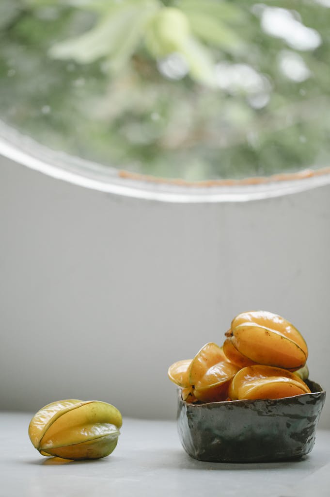 Carambola fruit on white table