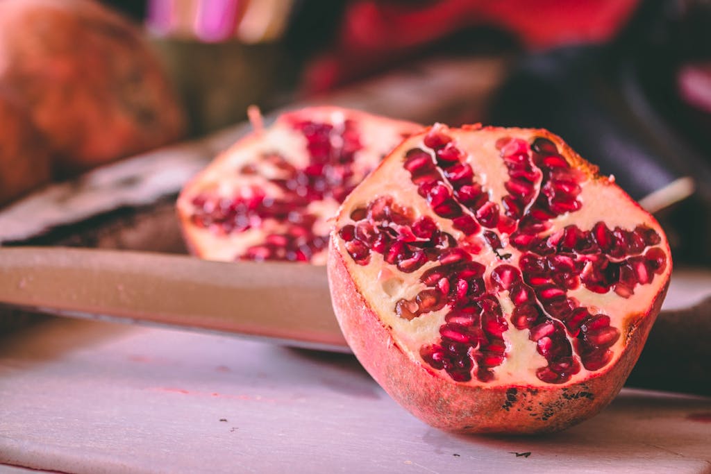 Selective Focus Photography of Sliced Passion Fruit