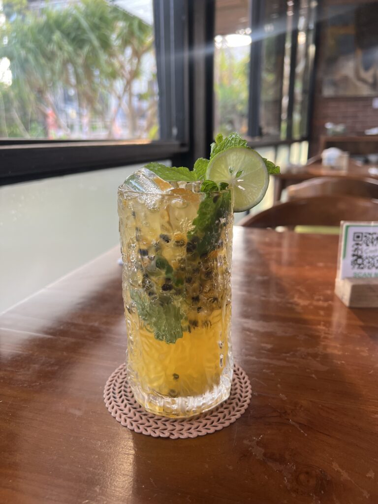 a yellow mocktail at a Seminyak Beach club