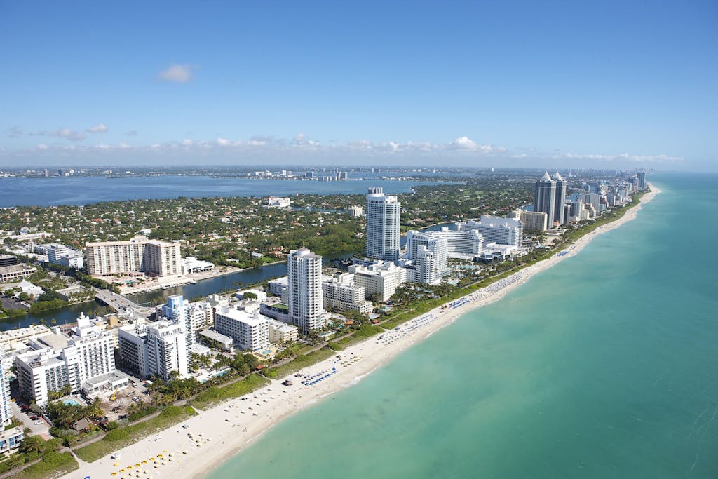 Aerial View of City Buildings Near Body of Water