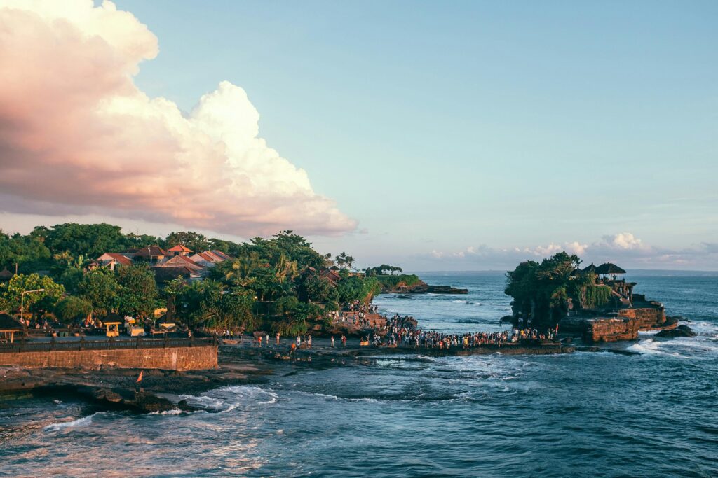 A shot of the Tanah Lot Temple and the ocean around it