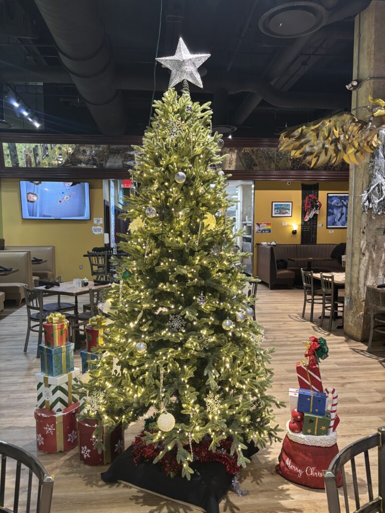 a big Christmas tree in BusBoys and Poets in DC