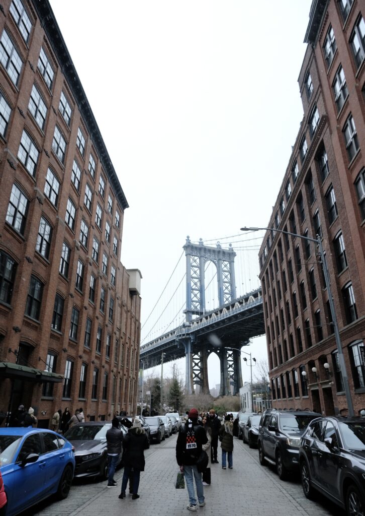 Dumbo Manhattan Bridge View during the winter and light snow if falling