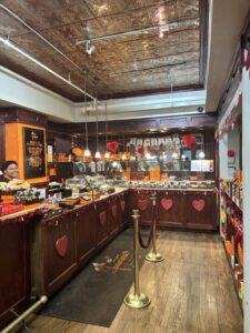 the inside of Jacques Torres Chocolate, a coffee shop in DUMBO